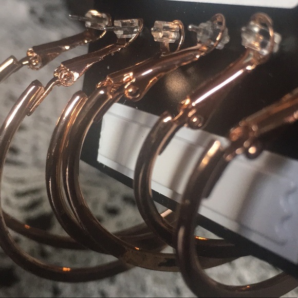 Set of 3 rose gold tone hoop earrings. - Picture 2 of 2